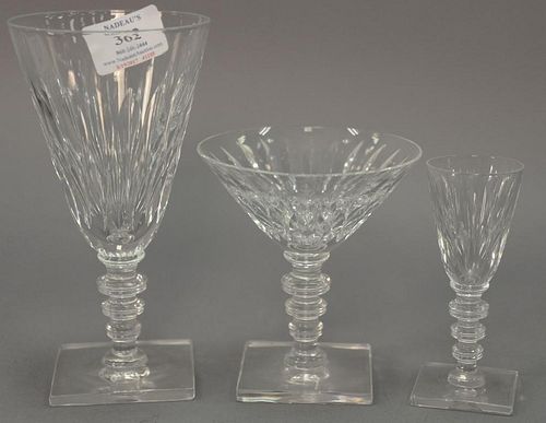 Twenty-six piece lot to include partial set of Hawke's stemmed crystal glasses, diamond cut with turned stems and square base