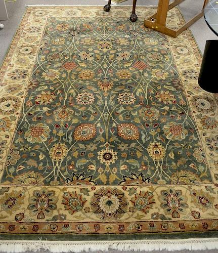 Oriental carpet, green and tan. 6' x 9'