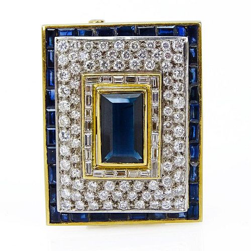 Sapphire, Diamond and 18 Karat Yellow Gold Brooch set in the Center with an Emerald Cut Sapphire