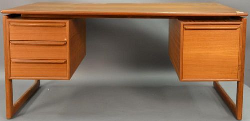 Danish teak desk. ht. 28in., top: 29 1/2" x 59"