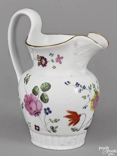Philadelphia Tucker porcelain pitcher, ca. 1825, with unusual overall floral decoration, 9 1/4'' h.