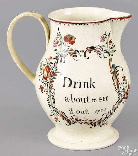 English creamware pitcher, dated 1782, inscribed Drink a-bout & see it out, the reverse with a