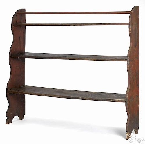 Pennsylvania painted pine bucket bench, ca. 1800, retaining an old red surface, 56 1/2'' h., 62 3/4