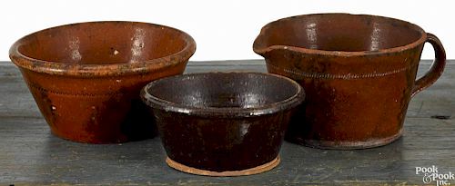 Two Pennsylvania redware bowls, 19th c., with manganese splotching, 3 1/4'' h., 7'' dia. and 2 3/4''