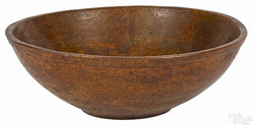 New England burl bowl, 19th c., with a molded rim, 6'' h., 18'' dia.