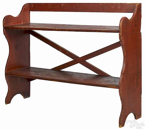 Pennsylvania painted pine bucket bench, 19th c., with scalloped sides, retaining an old red surfac