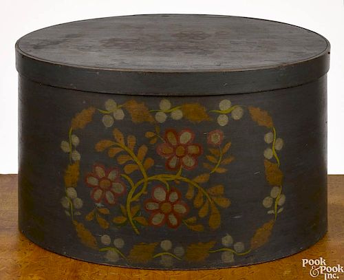 New England painted and stenciled pine hatbox, mid 19th c., with floral and vine decoration on a b