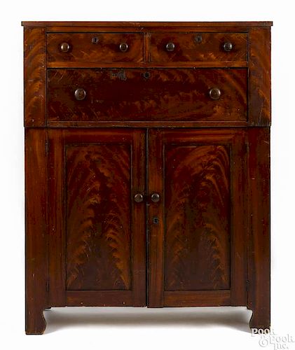 York County, Pennsylvania painted poplar cupboard, mid 19th c., retaining its original red flame g