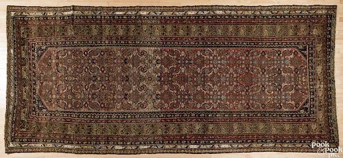 Northwestern Persian carpet, early 20th c., 16' x 7'.