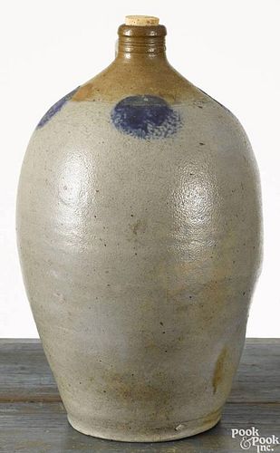 Pennsylvania ovoid stoneware jug, early 19th c., with cobalt circles around shoulder, 14 3/4'' h.