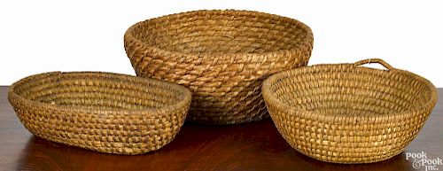 Three Pennsylvania rye straw baskets, 19th c., largest - 5 1/2'' h., 13 1/2'' w.