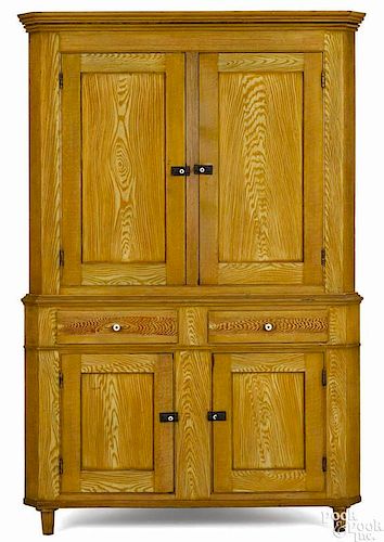 Adams County, Pennsylvania painted two-part corner cupboard, late 19th c., retaining its original