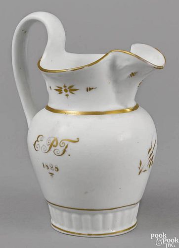 Philadelphia Tucker porcelain pitcher, dated 1828, initialed in gilt lettering EPT, 9 1/4'' h.