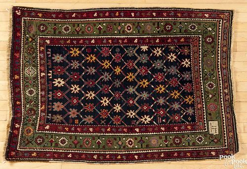 Persian mat, early 20th c., 4'7'' x 3'4''.