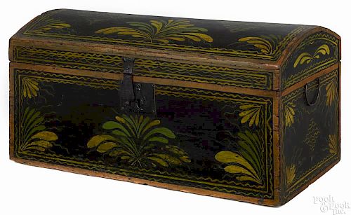 Massachusetts painted pine dome lid box, 19th c., retaining its original floral decoration on a bl