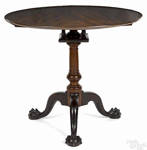 Philadelphia Chippendale mahogany tea table, ca. 1770, with a suppressed ball standard and ball an