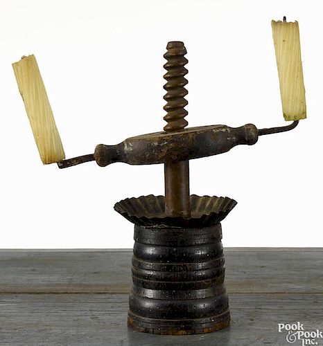 Tin, iron, and wood make-do adjustable table top candleholder, early 19th c., 10'' h.