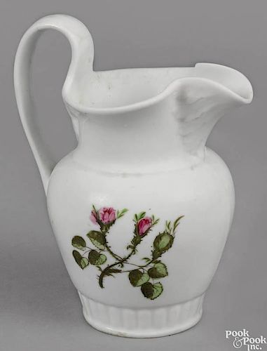 Philadelphia Tucker porcelain pitcher, ca. 1825, with floral decoration, 9 1/4'' h.