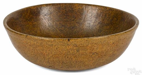 New England burl bowl, 19th c., with a molded rim, 5 1/4'' h., 16 3/4'' dia.