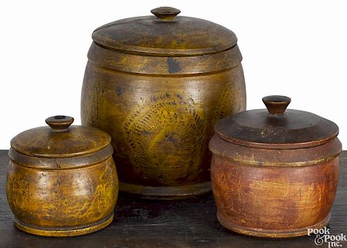 Three Pennsylvania turned and painted poplar tobacco boxes, 19th c., retaining their original spon