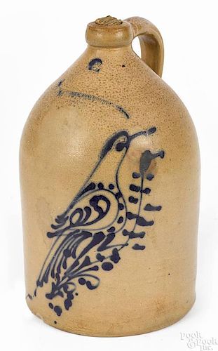 New York two-gallon stoneware jug, 19th c., impressed N. A. White Binghamton, with cobalt bird o