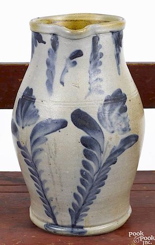 Pennsylvania Remmey type stoneware pitcher, 19th c., with cobalt tulip decoration, 13'' h.