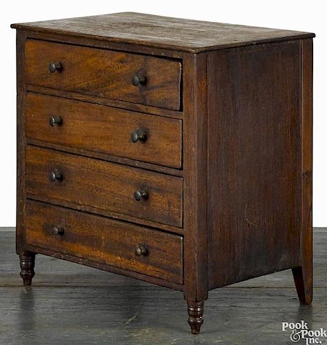 Miniature Pennsylvania Sheraton mahogany chest of drawers, ca. 1820, 9 5/8'' h., 9'' w.