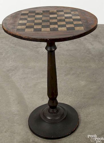 Pennsylvania painted poplar games table, late 19th c., with a checkerboard top, 30'' h., 21 1/2'' w.