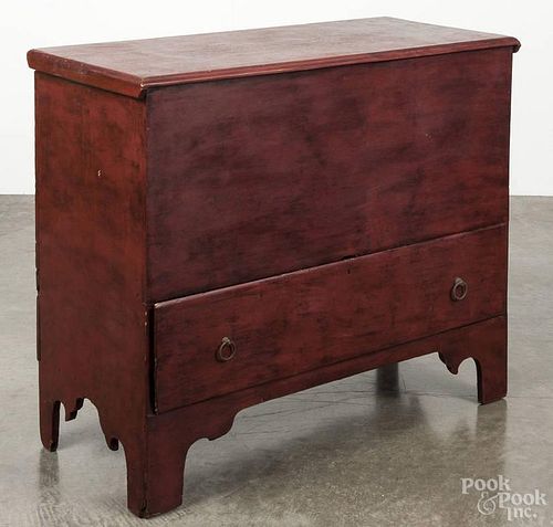 New England painted pine mule chest, late 18th c., retaining a later red surface, 33 1/2'' h., 38'' w.