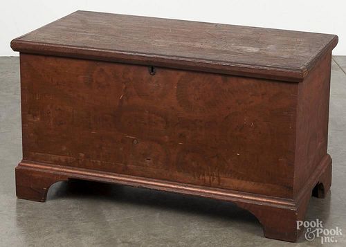 Pennsylvania painted pine blanket chest, 19th c., retaining the original red grained surface, 21'' h.