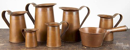 Set of six copper measures, 20th c., stamped with a buck, tallest - 10 1/4'' h, together with a coppe