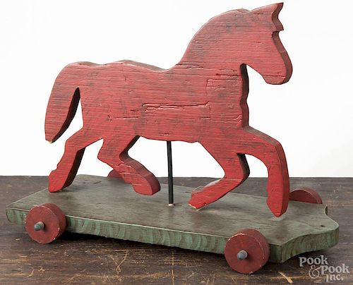 Contemporary painted pine cutout horse pull toy, 13'' h., 17 1/4'' l.