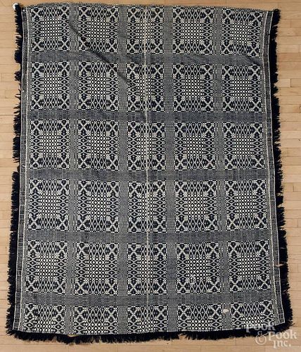 Blue and white overshot coverlet, mid 19th c., 96'' x 78''.