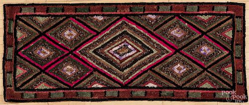 Hooked rug with repeating diamonds, early 20th c., 73'' x 30''.