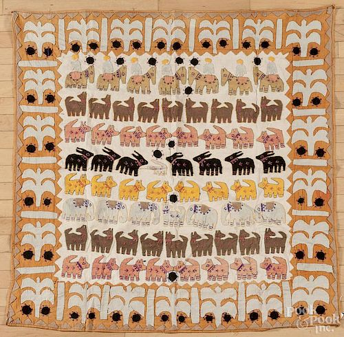 Embroidered child's blanket, mid 20th c., with repeating rows of animals, 46'' x 48''.