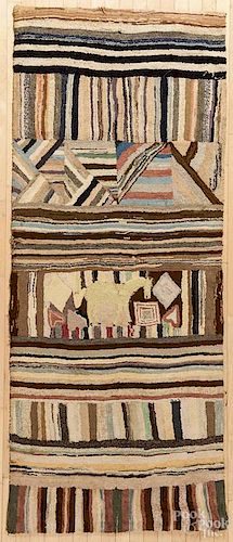 Large geometric hooked rug, early 20th c., with a horse and hearts, 94'' x 39''.