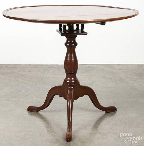 Pennsylvania Chippendale walnut tea table, ca. 1780, with a dish top over a birdcage support, 28 1/2