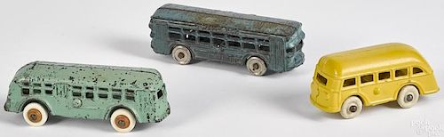 Three cast iron buses