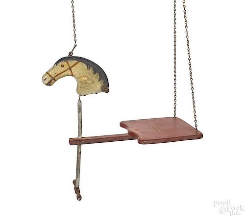 Carved and painted pine horse head child's swing