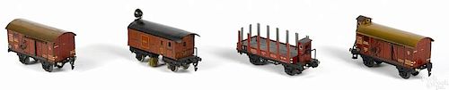 Four Marklin O gauge freight train cars