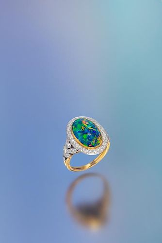 An Edwardian Platinum Topped Gold, Black Opal and Diamond Ring, Marcus & Co., 4.80 dwts.