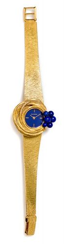 An 18 Karat Yellow Gold and Lapis Lazuli Wristwatch, Yves Saint Blais for Bucherer, 31.20 dwts.