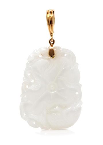 A Yellow Gold and White Jadeite Pendant, 12.60 dwts.