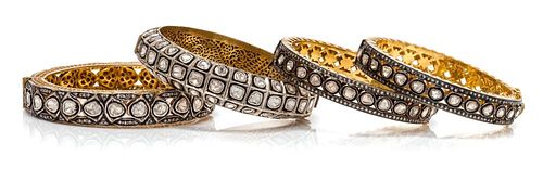 A Collection of Gilt Silver and Diamond Bangle Bracelets, 111.60 dwts.