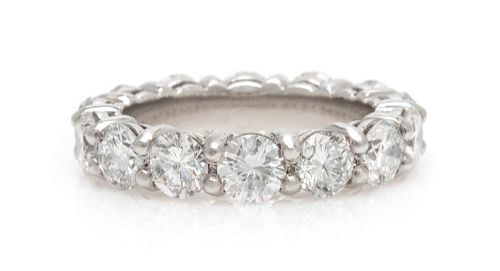 A Platinum and Diamond Eternity Ring, 5.80 dwts.