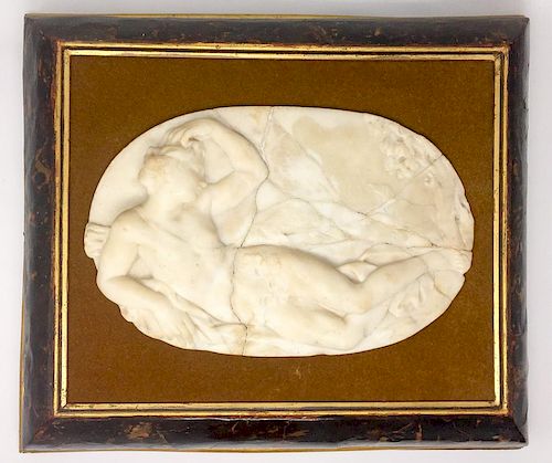 A Marble Oval Plate of a Reclining Woman in a Tortoise Shell Wooden Frame