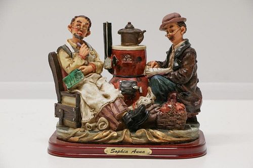 Americana Carvings of Two Figures