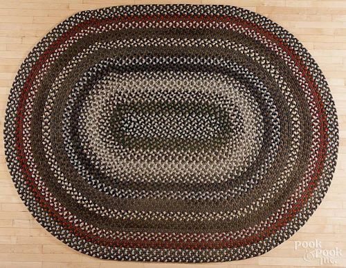 Three contemporary braided rugs, largest - 9' x 7'.