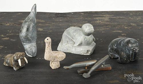 Five Inuit soapstone animal carvings, together with a carved bone bird, tallest - 5''.