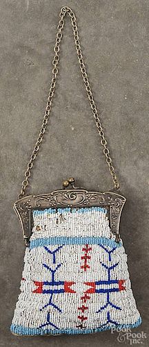Native American Indian beaded purse, early 20th c., with German silver clasp, 6 3/4'' h., 5 3/4'' w.,